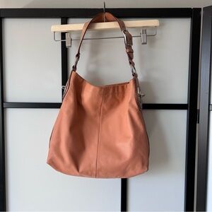 Coach Penelope Shoulder Hobo Bag in a Peach Coral Leather